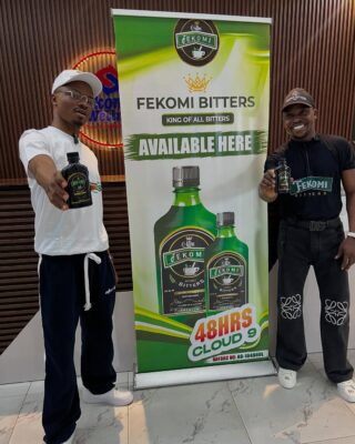 Ola of Lagos, holding fekomi bitters